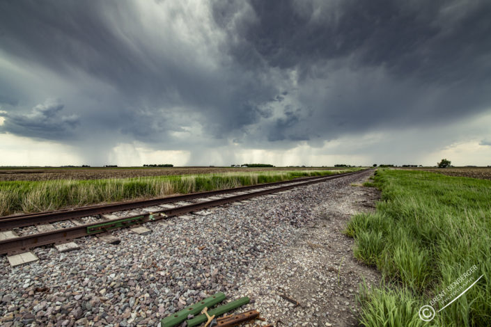 Railroad and rainy skies
