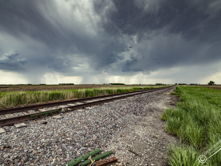 Railroad and rainy skies